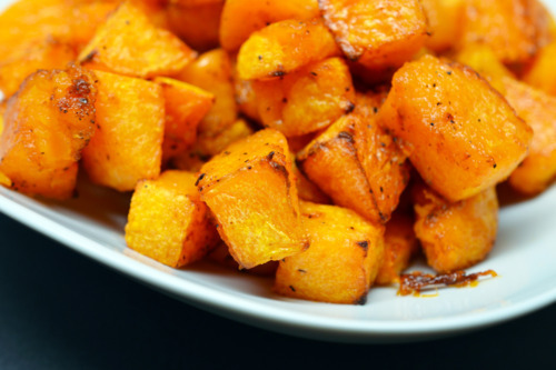 Cubed paleo and Whole30 roasted butternut squash on a plate.